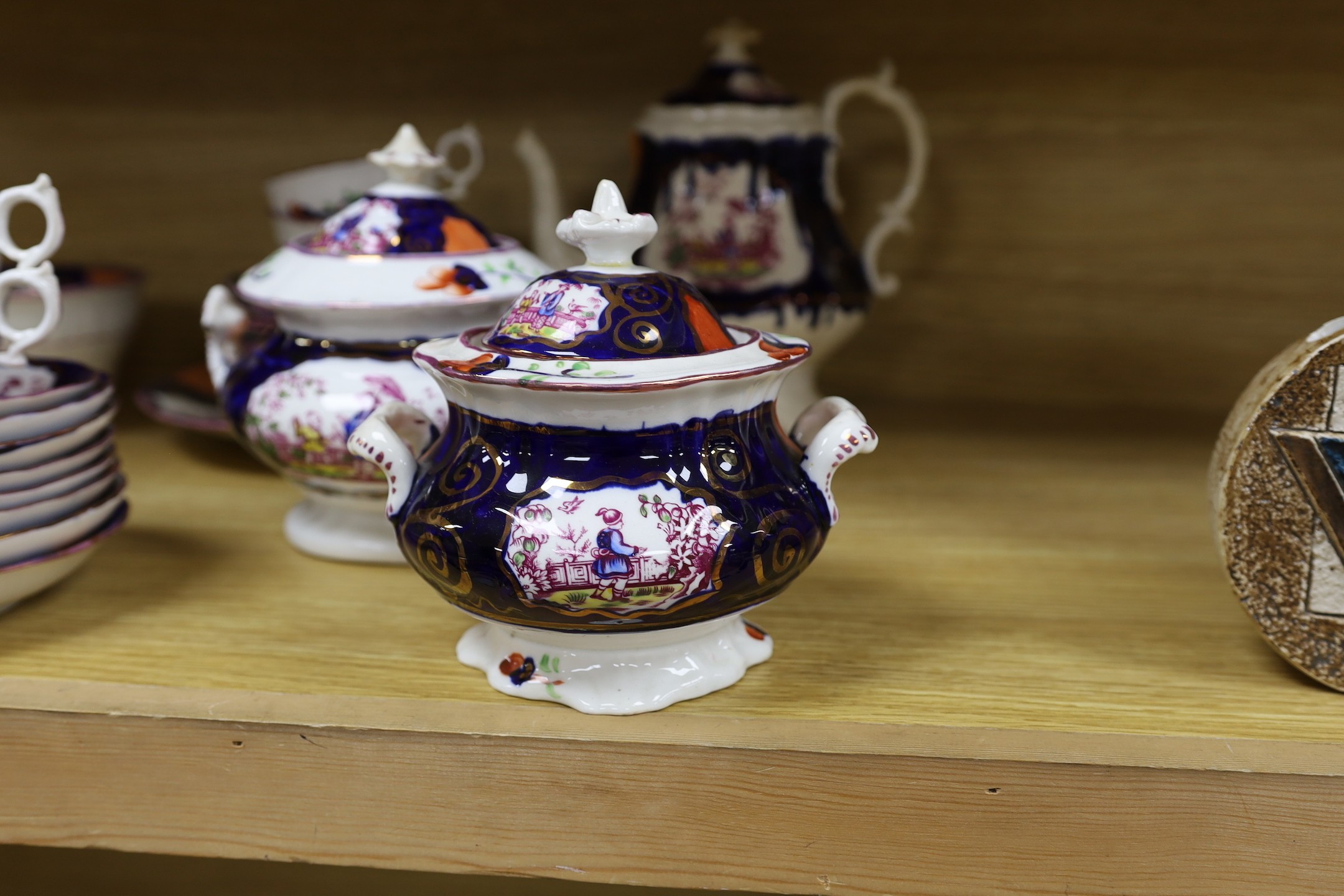 A quantity of Gaudy Welsh lustre tea wares with chinoiserie motifs